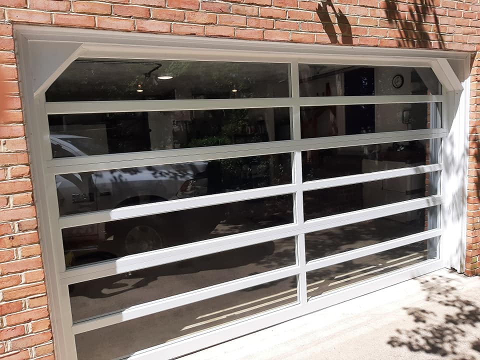 glass commercial garage door installation