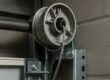 Garage door lift cable and drum assembly close-up - cable repair Chesapeake VA
