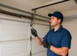 Garage door maintenance checklist - technician inspecting garage door in Chesapeake VA