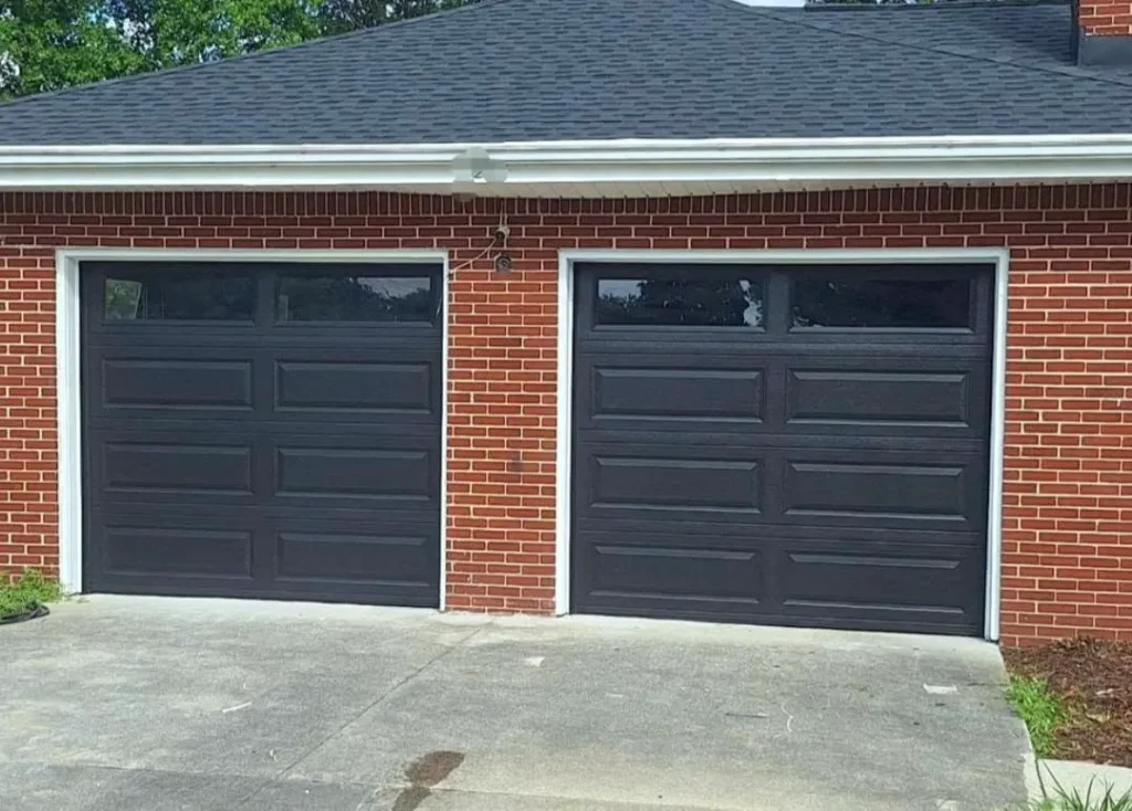 Black long panel with glass garage door - Garage Door Enterprises, Chesapeake VA